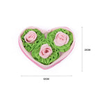 Heart-shaped snuffle mat with rose designs in pink and green